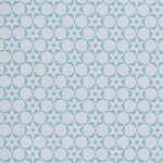 Wallpaper in a floral lattice print in powder blue on a cream field