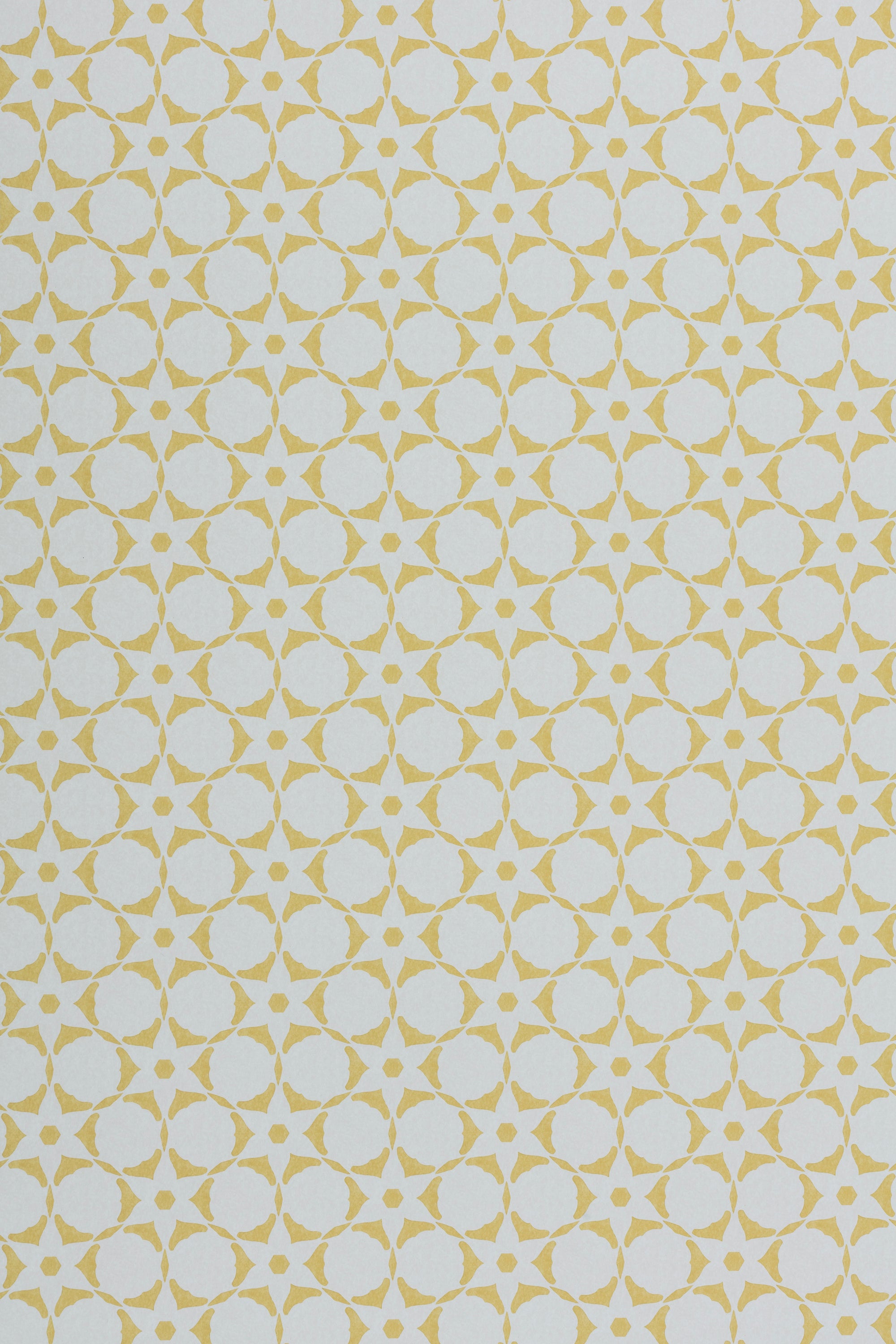 Wallpaper in a floral lattice print in  yellow on a cream field