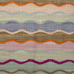 Multicolored wavy patterned rug with various colors.