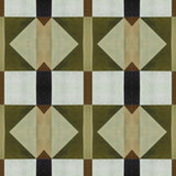 Detail of wallpaper in a geometric grid print in shades of green and brown on a cream field.