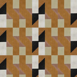 Detail of wallpaper in a geometric grid print in shades of rust, yellow and gray on a cream field.