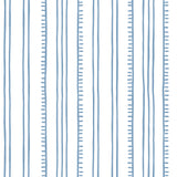 Detail of wallpaper in a playful stripe pattern in light blue on a white field.