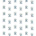 Detail of fabric in an abstract shape print in teal and navy on a white field.