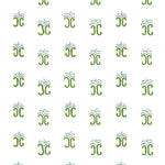 Detail of wallpaper in an abstract shape print in green, blue and navy on a white field.