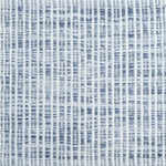 Flatweave rug in a solid and dashed stripe in cream on strié blue field