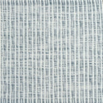 Flatweave rug in a solid and dashed stripe in cream on strié grey field