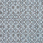 Flatweave rug in a small scale decorative lattice design in cream on a pale grey field.