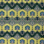 Patterned rug with green and blue botanical design