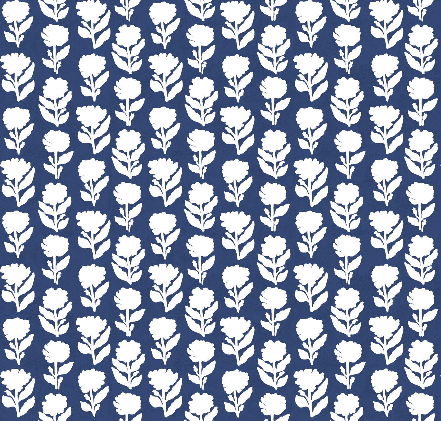 Detail of fabric in a classic floral silhouette print in cream on a cobalt field