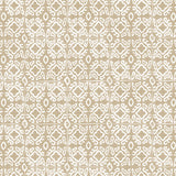 Detail of fabric in a gridded damask print in white on a tan field.