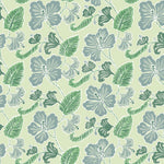 Detail of wallpaper in a flower and leaf print in shades of blue and gray-green on a green field.