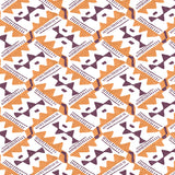 Detail of wallpaper in painterly diamond print in maroon and orange on a white field.