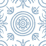 Detail of wallpaper in a playful medallion print in light blue on a white field.