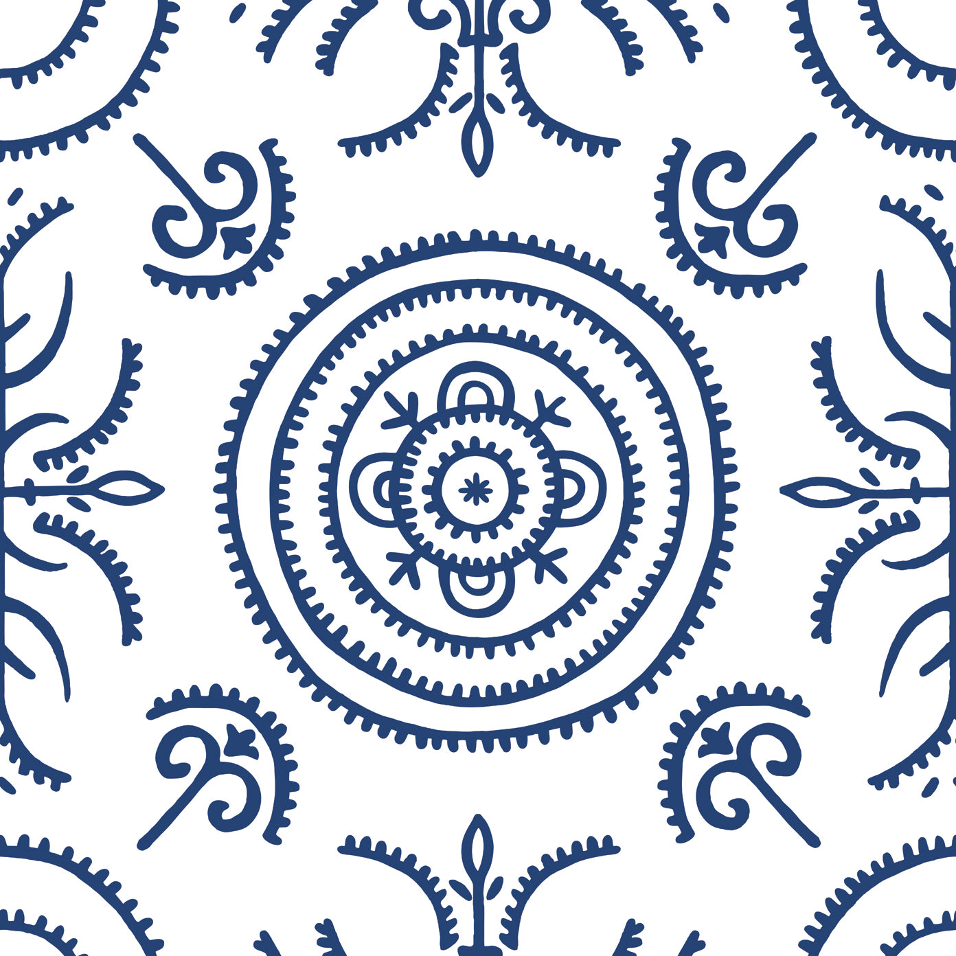 Detail of wallpaper in a playful medallion print in navy on a white field.