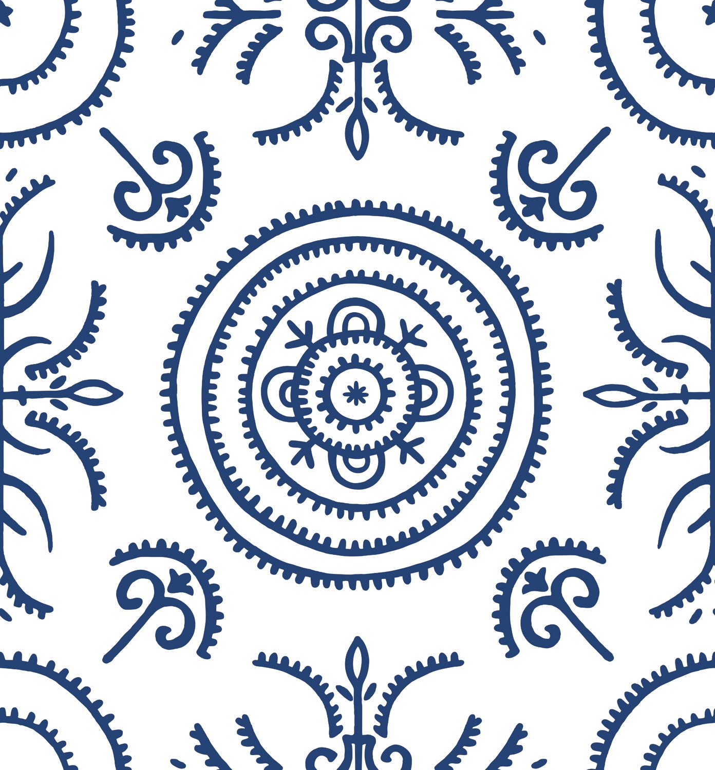 Detail of wallpaper in a playful medallion print in navy on a white field.