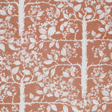 White tree and leaf design on a warm red field. 