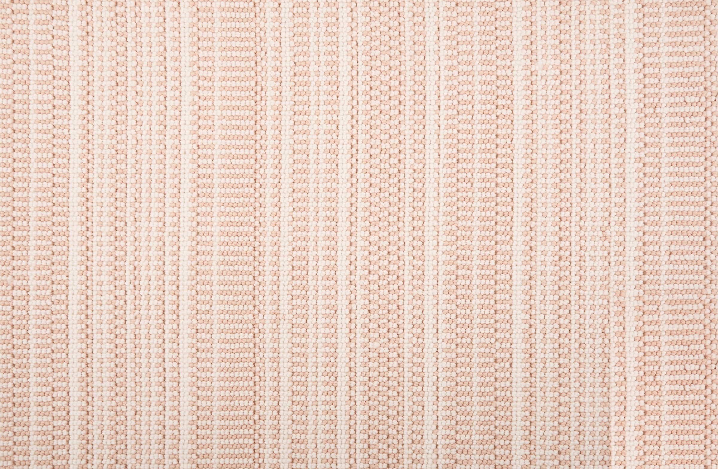 Broadloom carpet in  textural stripe design in white and light pink.