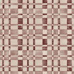 Detail of fabric in a large-scale checked pattern in shades of wine purple and beige. 