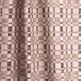 Gently draped fabric in a large-scale checked pattern in shades of wine purple and beige. 