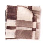 Stacked swatches of fabric in a large-scale checked pattern in shades of wine purple and beige. 