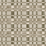 Detail of fabric in a large-scale checked pattern in shades of olive green and cream. 