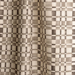 Gently draped fabric in a large-scale checked pattern in shades of charcoal grey and cream.