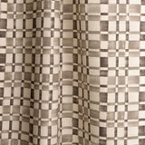 Gently draped fabric in a large-scale checked pattern in shades of charcoal grey and cream.