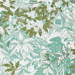 Patterned wallpaper with green leaves and white flowers on a light blue background