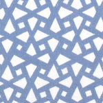 Detail of fabric in a geometric lattice print in blue on a white field.