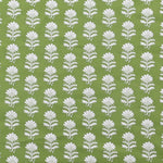 Detail of fabric in a repeating thistle print in white and green on a green field.