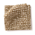 Stacked swatches of fabric in a textural wicker pattern in warm brown on a white field. 