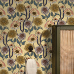Floral wallpaper with a towel hanging on a hook