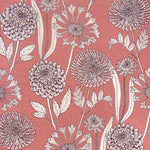 Large-scale floral print in purple and white on a light pink field.