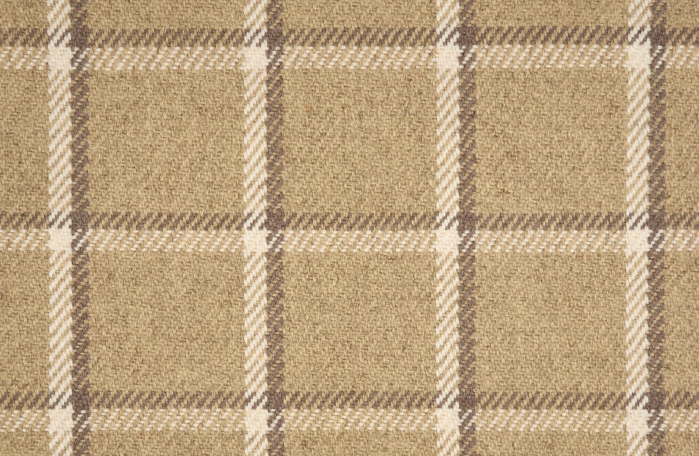 Broadloom carpet in a windowpane plaid in brown and cream on taupe. 