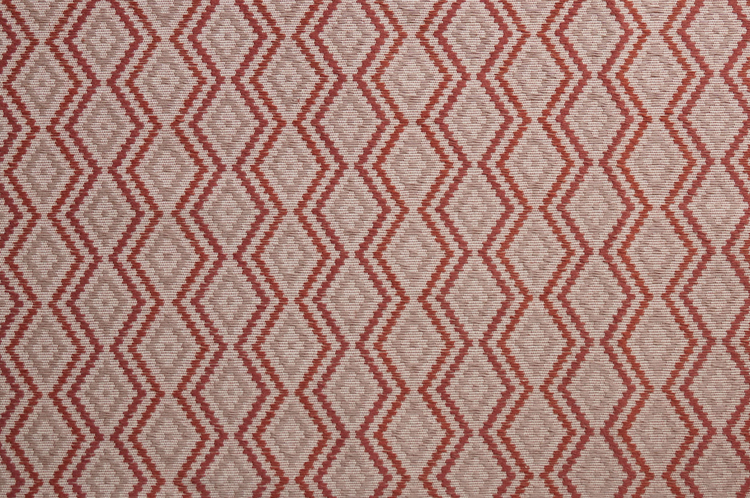 Textile with red zigzag pattern on beige background