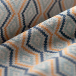 Close-up of fabric with blue and yellow geometric pattern