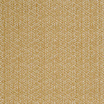 Detail of a linen fabric in a detailed geometric pattern in white on a goldenrod field.