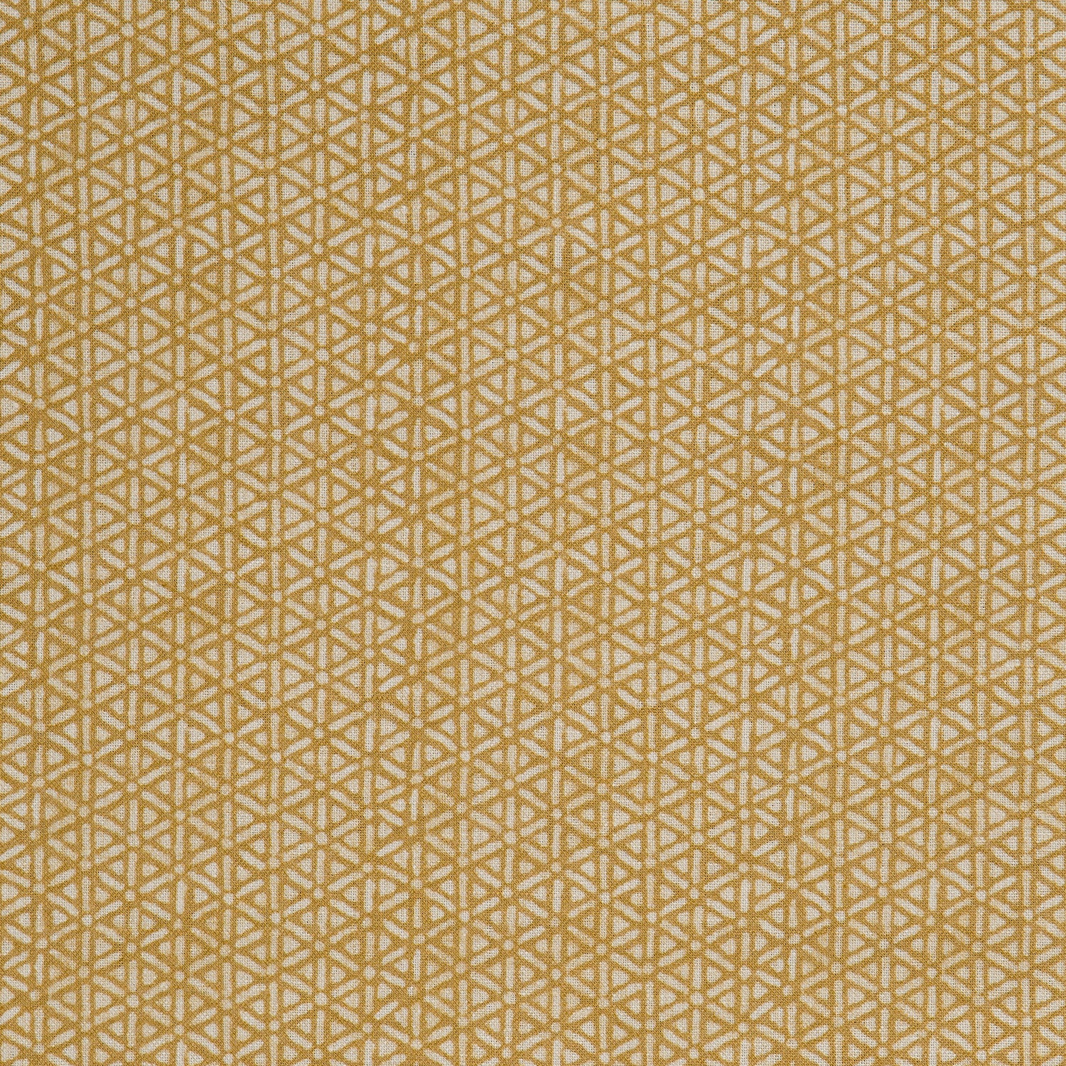Detail of a linen fabric in a detailed geometric pattern in white on a goldenrod field.
