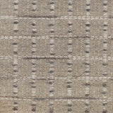 Broadloom carpet with raised gridded plaid in shades of grey and cream on an oatmeal ground. 
