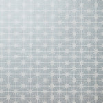 Detail of wallpaper in a geometric damask print in cream on a light blue field.