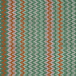 Handwoven silk fabric with zigzag design in green, orange, and beige.