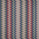 Handwoven silk fabric with zigzag design in red, blue, and beige.