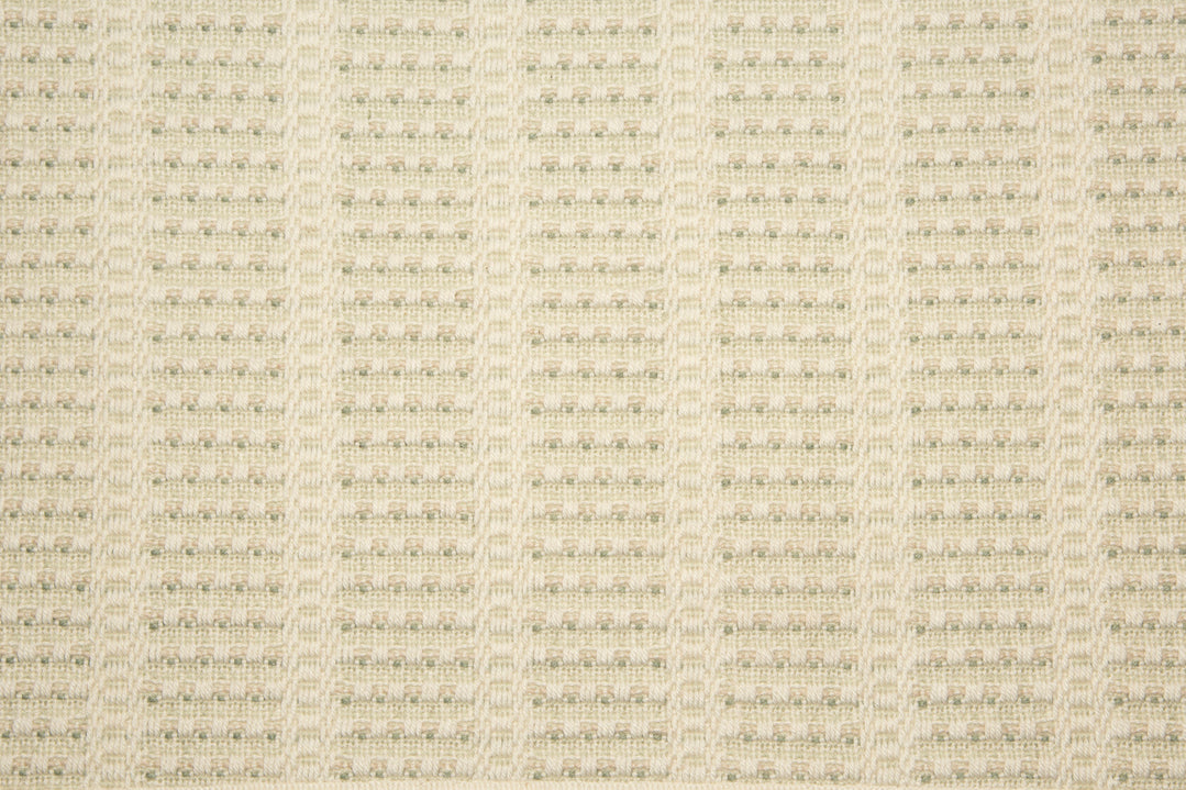 Broadloom carpet with textured stripe design in cream with light green accents. 