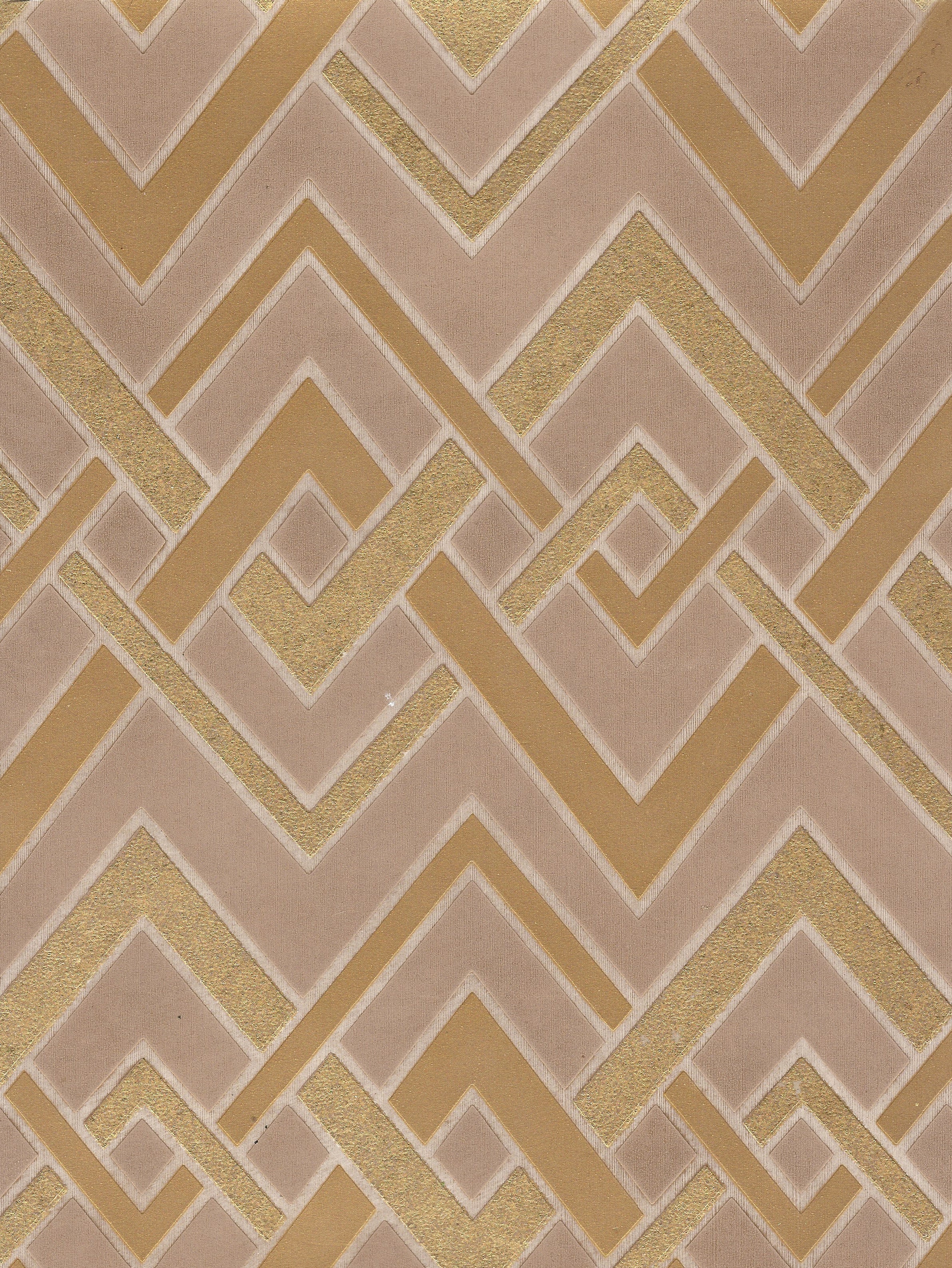 Detail of wallpaper in an interlocking zig zag print in shades of gold, brown and cream.
