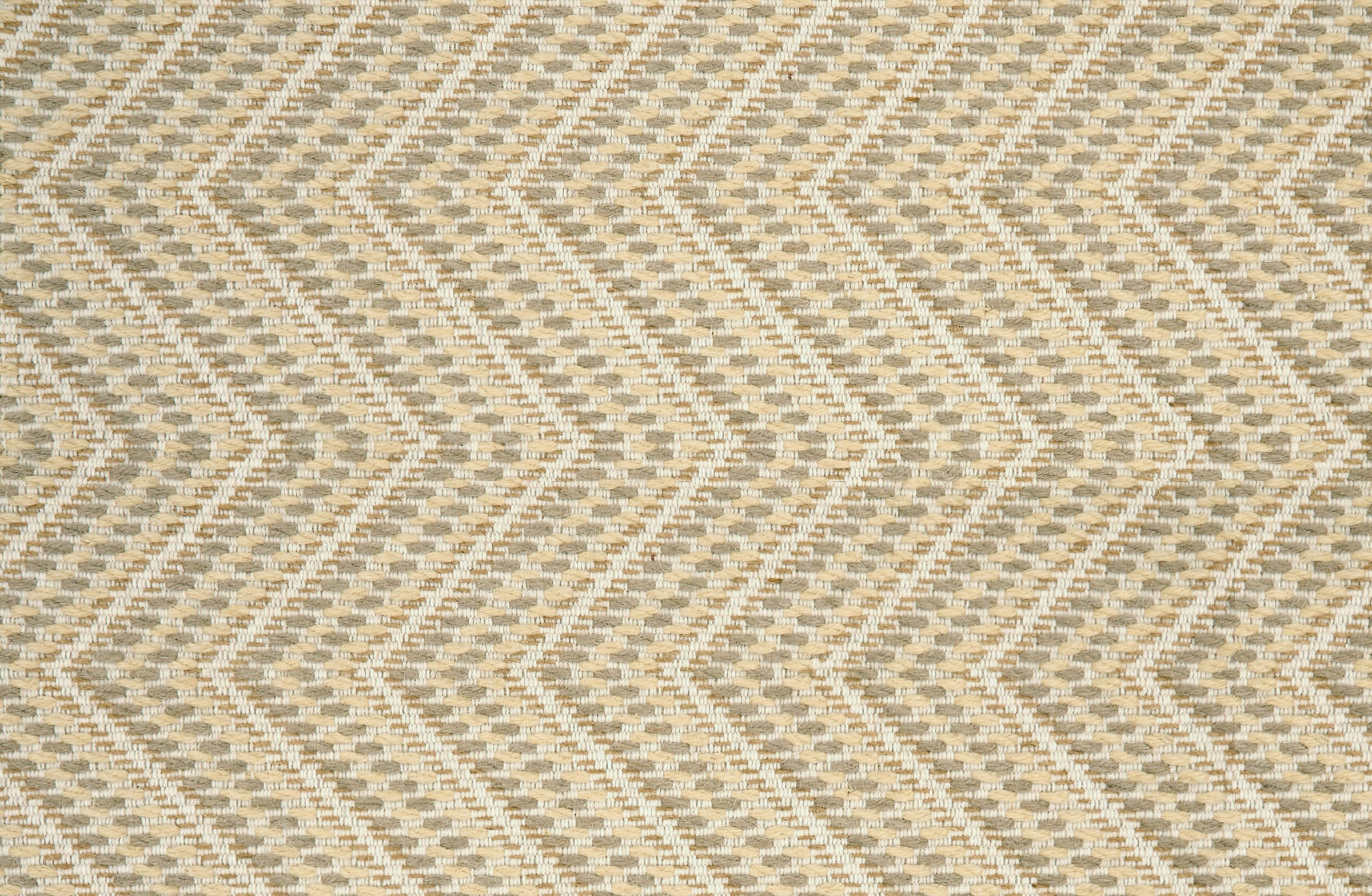Broadloom carpet with zig zag stripe in warm tan.