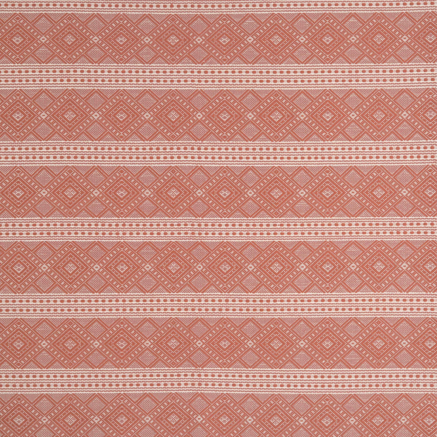 Patterned fabric with orange and cream geometric design