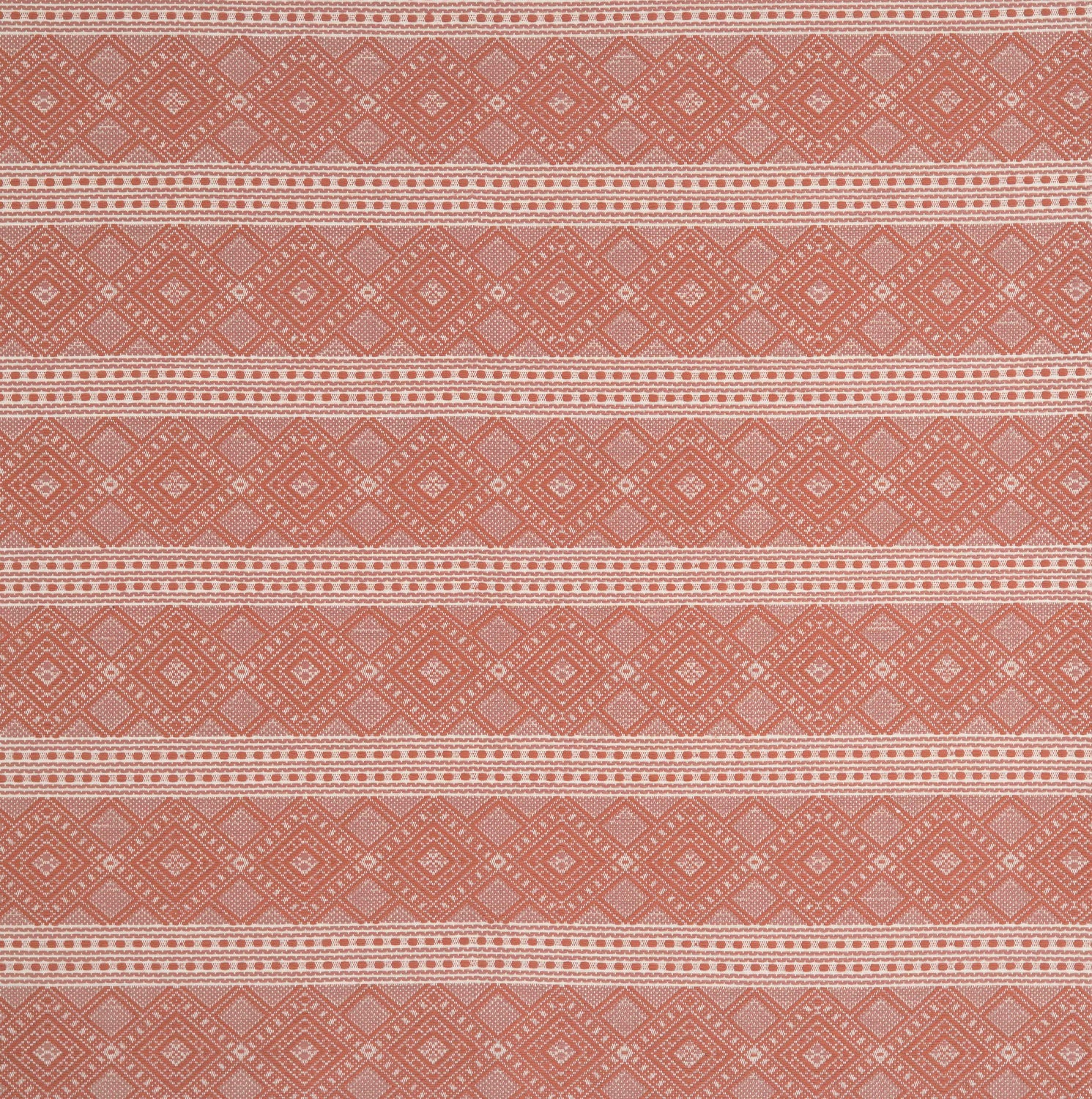 Patterned fabric with orange and cream geometric design