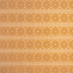 Patterned fabric with geometric design in yellow and cream tones