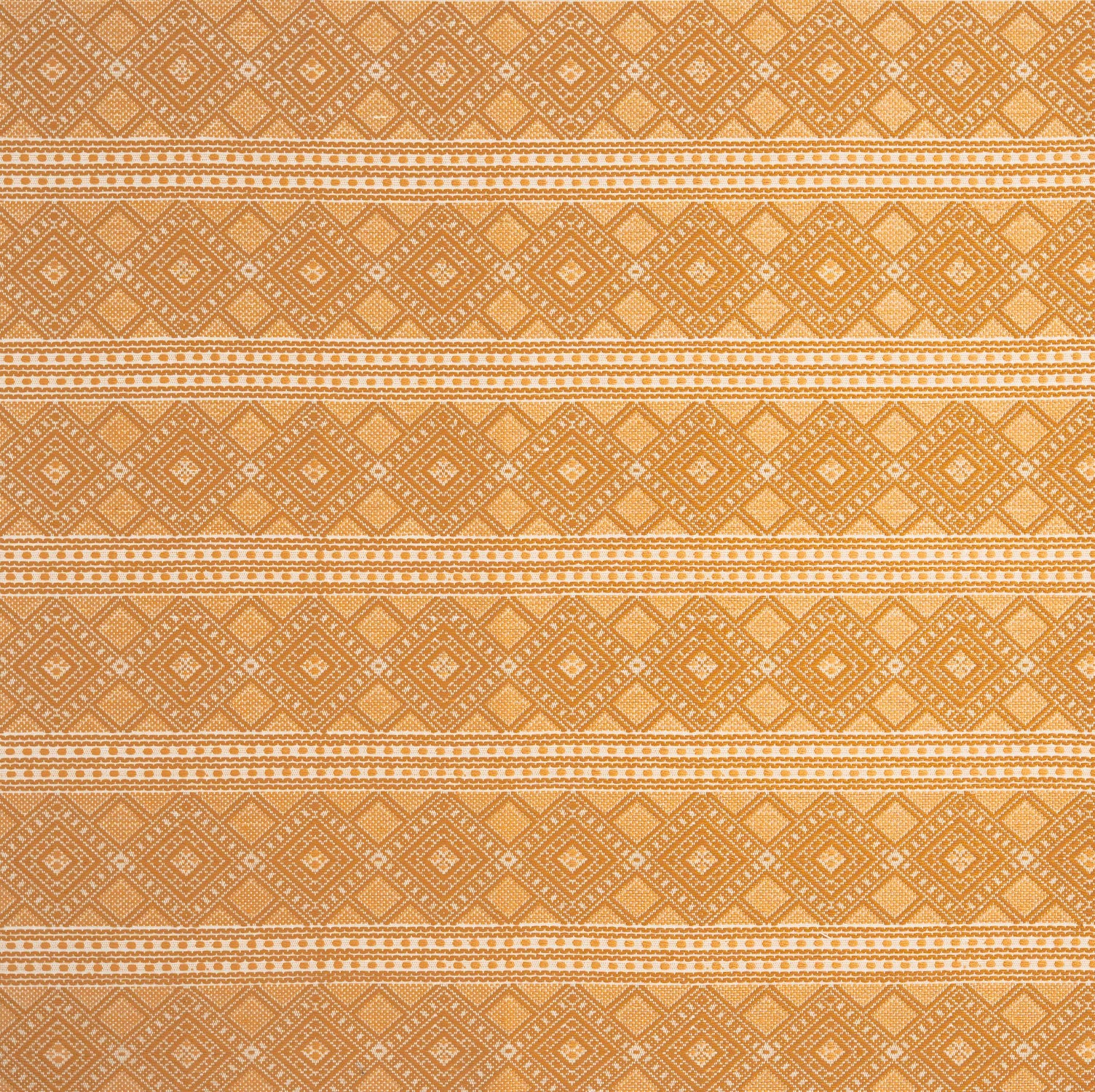 Patterned fabric with geometric design in yellow and cream tones
