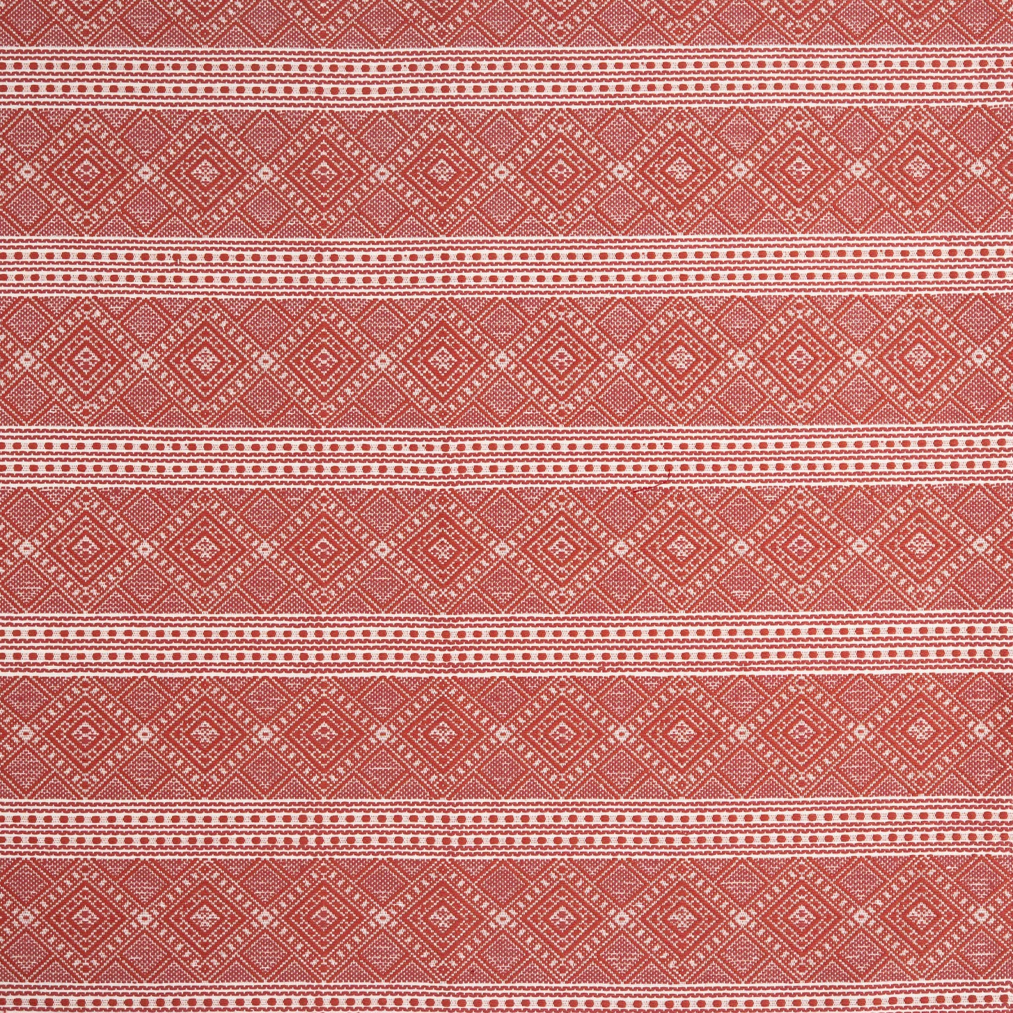 Patterned fabric with red and white geometric design
